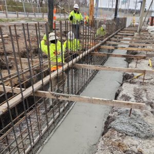 Markets-Berkeley-Flood-Wall-1000x1000 Construction workers build a flood wall