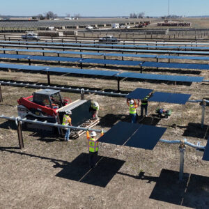 Markets-Solar-Bee-Hollow-1000x1000 A construction team installs panels in a solar field