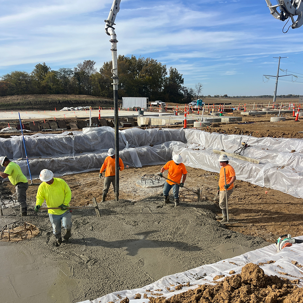 Ameren Baldwin Sub_500-2025-11-04-2D03426A-1000x1000 Construction workers spread wet concrete for a substation floor